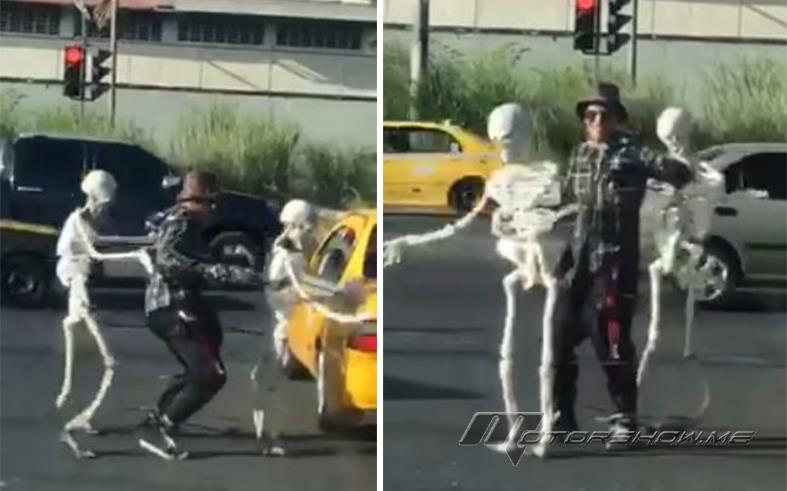 فيديو غريب: ماذا كنت ستفعل لو رأيت ما فعله هذا الرجل مع هياكل عظمية على الطريق؟